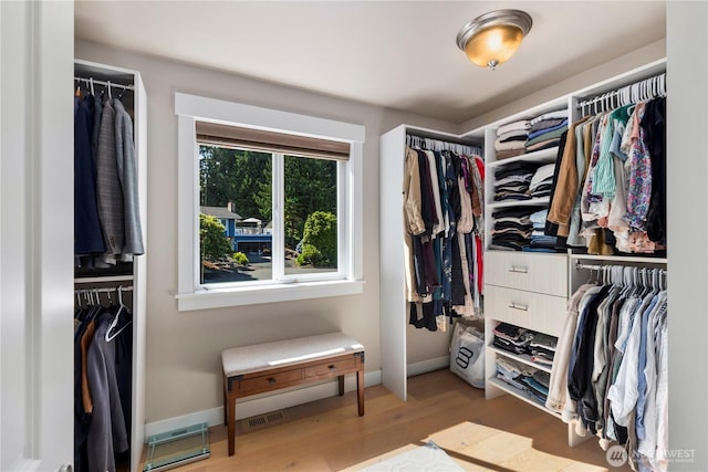 230 155th Pl SE, Bothell, WA 98012 - walk in closet featuring light wood-type flooring