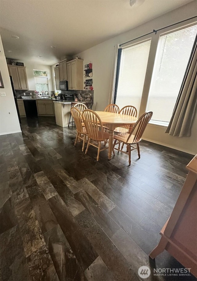 1720 Maple Ln Unit 33, Kent, WA 98031 - dining room featuring dark wood finished floors and baseboards