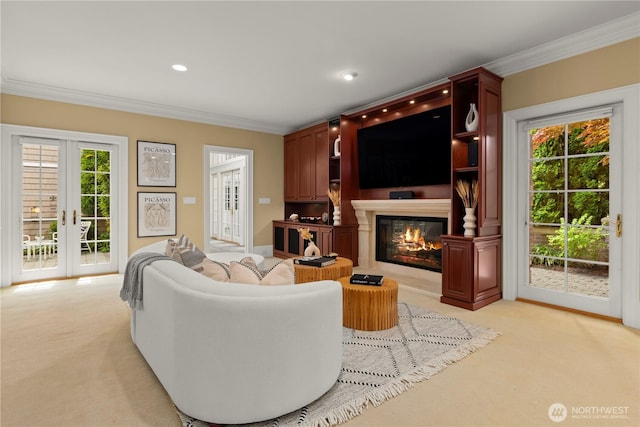 2530 39th Ave E, Seattle, WA 98112 - living area featuring light colored carpet, french doors, crown molding, a glass covered fireplace, and healthy amount of natural light
