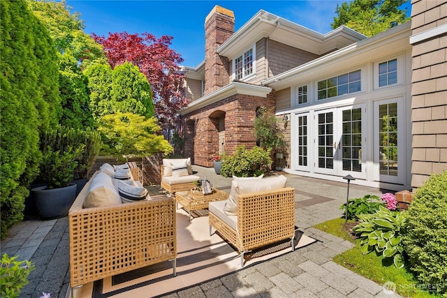 2530 39th Ave E, Seattle, WA 98112 - view of patio featuring french doors and outdoor lounge area