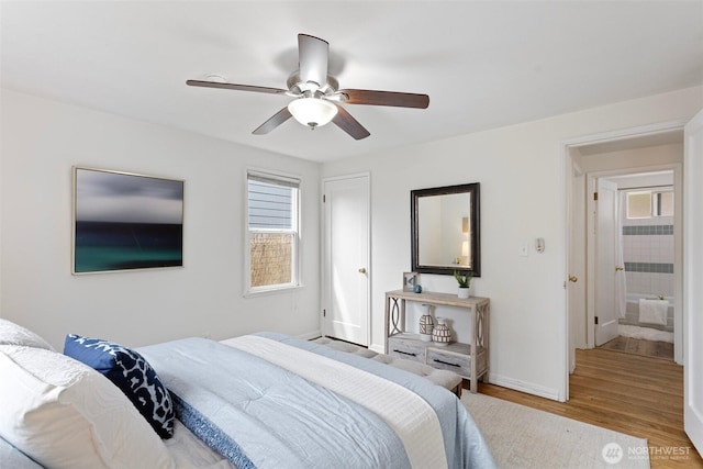 7147 29th Ave SW, Seattle, WA 98126 - bedroom featuring wood finished floors and a ceiling fan
