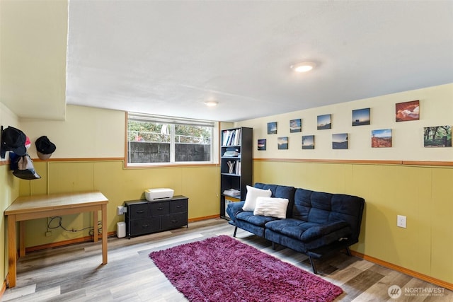7147 29th Ave SW, Seattle, WA 98126 - living area featuring wood finished floors and a wainscoted wall