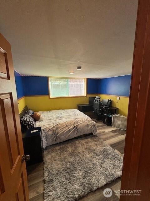 7147 29th Ave SW, Seattle, WA 98126 - bedroom featuring wood finished floors
