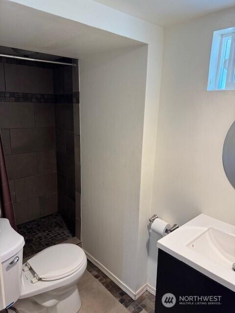7147 29th Ave SW, Seattle, WA 98126 - bathroom featuring a shower stall and vanity