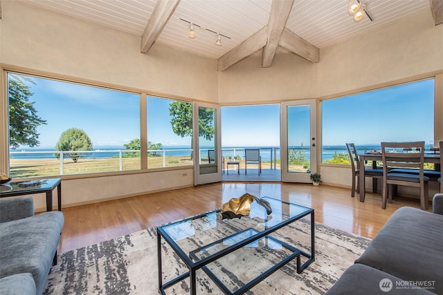 2641 E Bay St, Port Angeles, WA 98362 - living area with wood finished floors, plenty of natural light, a water view, and a wood ceiling with exposed beams
