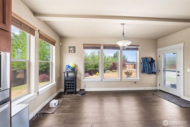 17116 138th Ave E, Puyallup, WA 98374 - unfurnished dining area with dark wood finished floors and baseboards