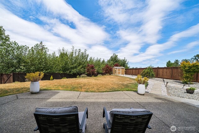 17116 138th Ave E, Puyallup, WA 98374 - fenced backyard featuring a shed and a patio