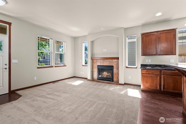 2309 43rd Ave SE, Puyallup, WA 98374 - unfurnished living room featuring carpet floors, a tile fireplace, and recessed lighting