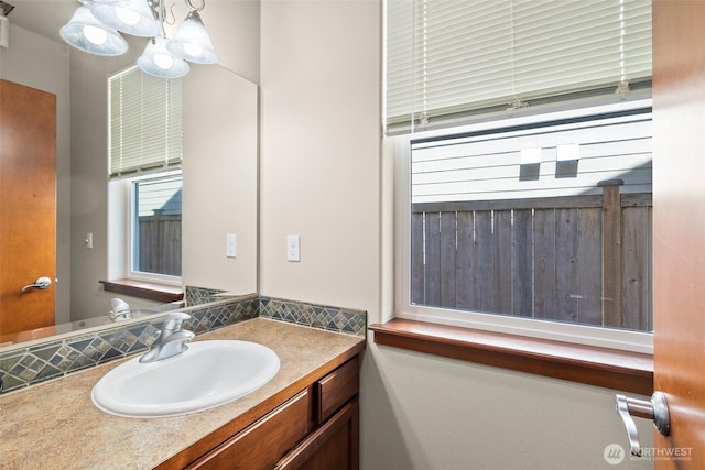 2309 43rd Ave SE, Puyallup, WA 98374 - bathroom featuring vanity and a chandelier