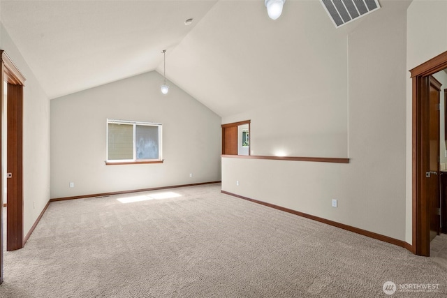 2309 43rd Ave SE, Puyallup, WA 98374 - unfurnished bedroom featuring carpet floors and vaulted ceiling