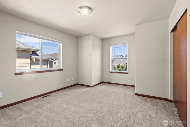 2309 43rd Ave SE, Puyallup, WA 98374 - unfurnished bedroom featuring carpet flooring and a closet