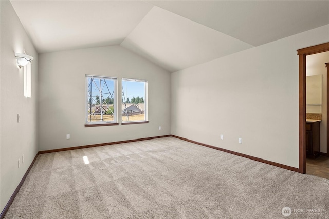 2309 43rd Ave SE, Puyallup, WA 98374 - carpeted spare room with lofted ceiling and baseboards