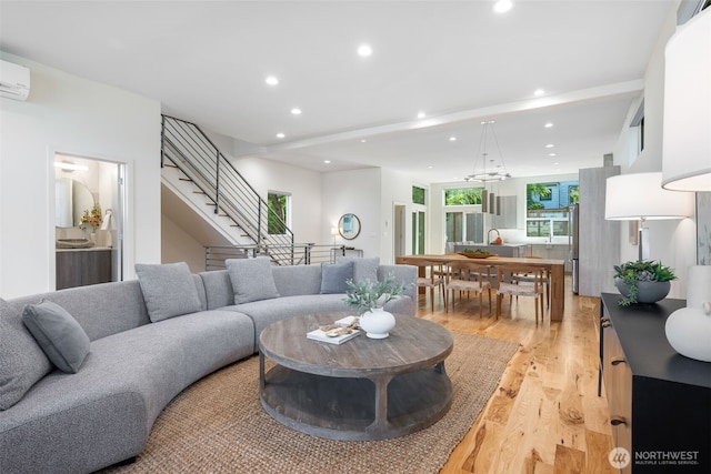 6012 Palatine Ave N, Seattle, WA 98103 - living room with light wood-style flooring, recessed lighting, and stairs
