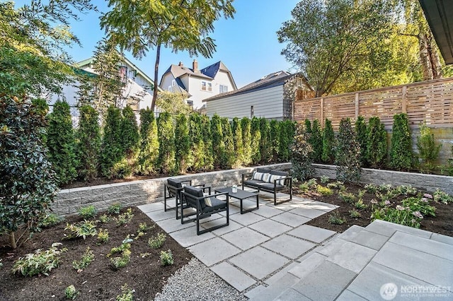 6012 Palatine Ave N, Seattle, WA 98103 - fenced backyard featuring an outdoor living space and a patio