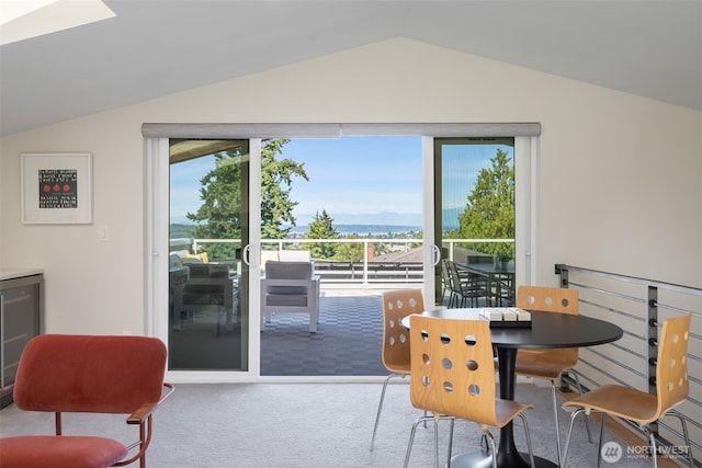 6012 Palatine Ave N, Seattle, WA 98103 - dining room with vaulted ceiling and carpet floors