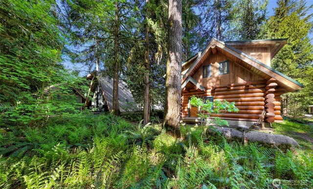 7010 Rainier Way, Deming, WA 98244 - view of home's exterior featuring log siding