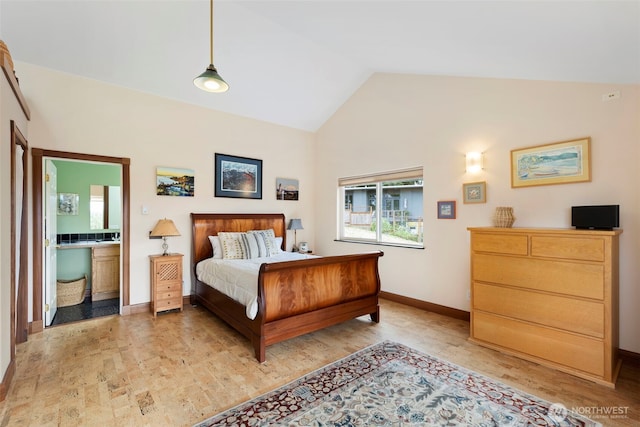 788 P St, Port Townsend, WA 98368 - bedroom with lofted ceiling, light wood finished floors, and ensuite bath