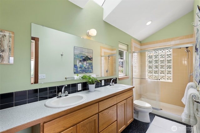 788 P St, Port Townsend, WA 98368 - bathroom with lofted ceiling, a shower stall, and double vanity