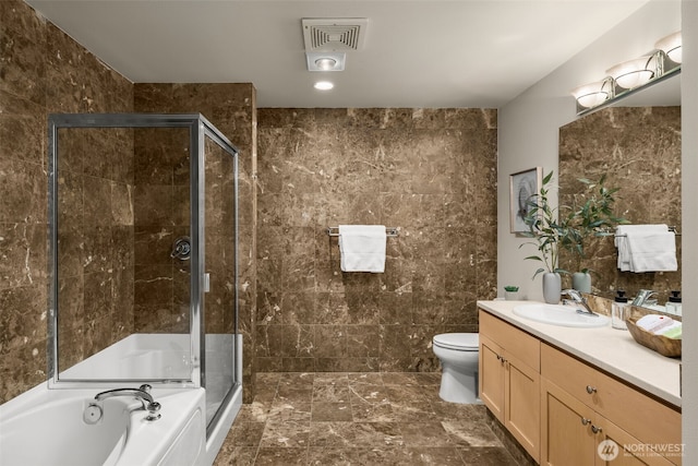 220 1st St Unit 204, Kirkland, WA 98033 - full bathroom featuring vanity, a stall shower, a bath, and tile walls