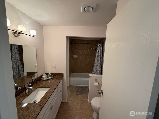 1555 Union Ave NE Unit 56, Renton, WA 98059 - bathroom with tile patterned floors, vanity, and shower / bath combo with shower curtain