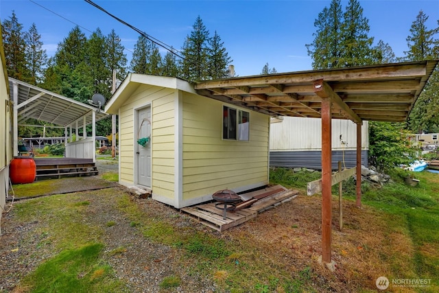 316 W Lake Samish Dr Unit 21, Bellingham, WA 98229 - view of shed with a carport