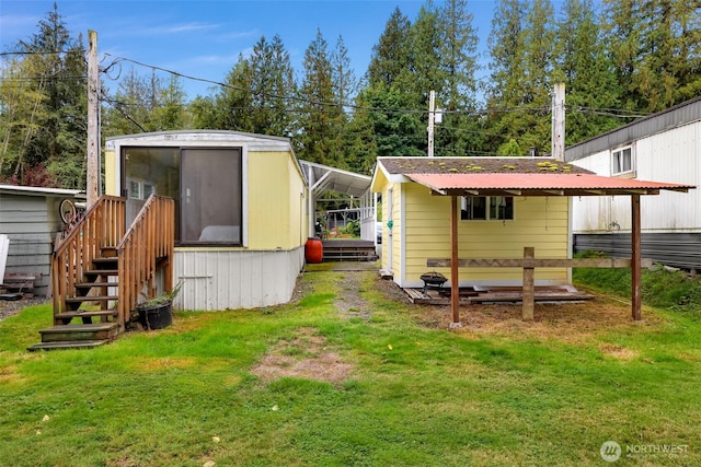 316 W Lake Samish Dr Unit 21, Bellingham, WA 98229 - back of property featuring a lawn