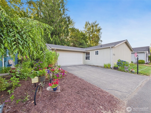 6704 243rd Ave E Unit 96, Buckley, WA 98321 - view of front of house featuring driveway and an attached garage