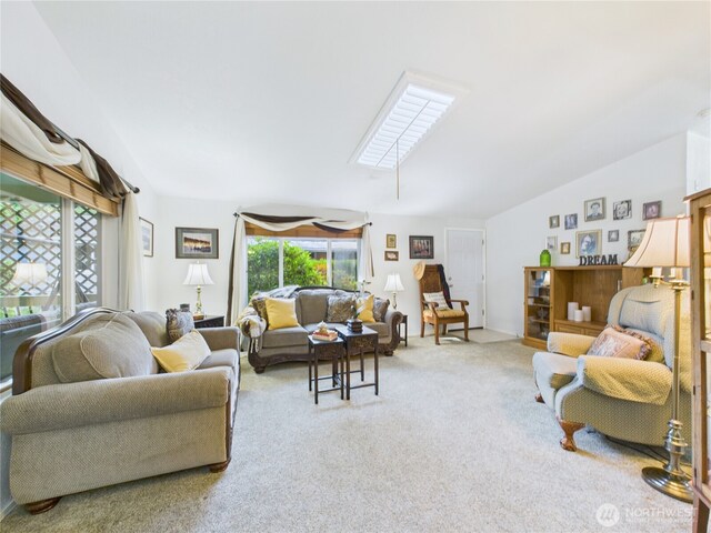 6704 243rd Ave E Unit 96, Buckley, WA 98321 - living area featuring vaulted ceiling and carpet floors
