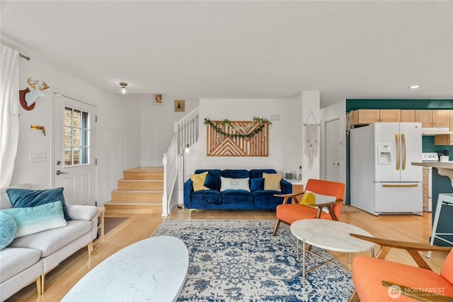 11 Condra Rd, Copalis Beach, WA 98535 - living room with light wood-type flooring, stairs, and recessed lighting