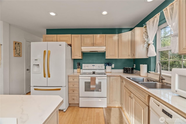 11 Condra Rd, Copalis Beach, WA 98535 - kitchen featuring white appliances, under cabinet range hood, recessed lighting, light countertops, and light wood-type flooring
