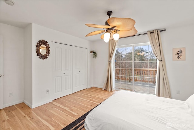 11 Condra Rd, Copalis Beach, WA 98535 - bedroom with light wood-type flooring, a ceiling fan, and a closet