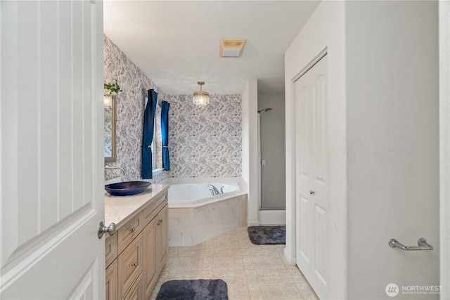 11 Condra Rd, Copalis Beach, WA 98535 - bathroom featuring a bath, a stall shower, and vanity