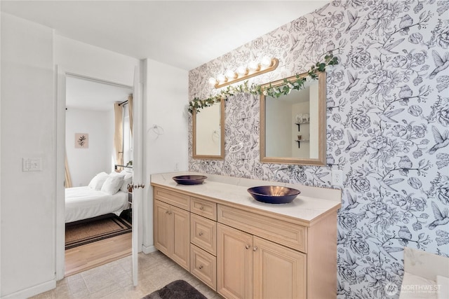 11 Condra Rd, Copalis Beach, WA 98535 - full bath with wallpapered walls, double vanity, and ensuite bathroom
