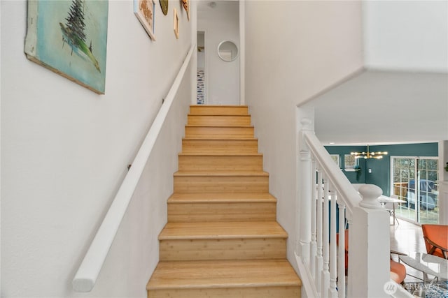 11 Condra Rd, Copalis Beach, WA 98535 - stairway with a chandelier and a towering ceiling