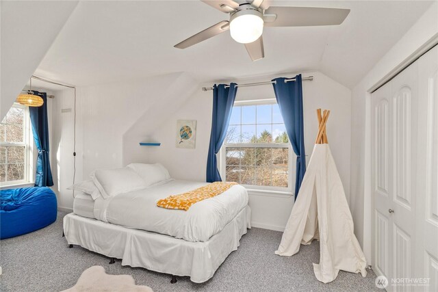 11 Condra Rd, Copalis Beach, WA 98535 - carpeted bedroom with vaulted ceiling, a closet, and ceiling fan