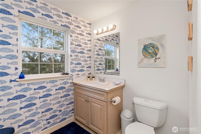 11 Condra Rd, Copalis Beach, WA 98535 - bathroom with vanity, plenty of natural light, and wallpapered walls
