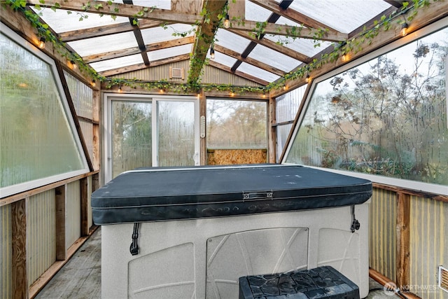 11 Condra Rd, Copalis Beach, WA 98535 - sunroom / solarium featuring a jacuzzi, lofted ceiling, and a skylight
