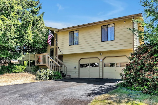 5103 S 302nd Pl, Auburn, WA 98001 - view of front of house featuring an attached garage and driveway