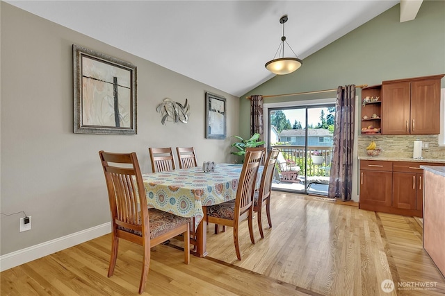 5103 S 302nd Pl, Auburn, WA 98001 - dining space featuring light wood finished floors and high vaulted ceiling
