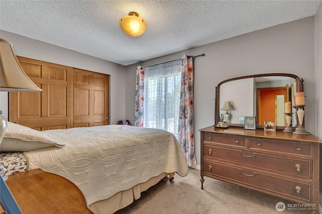 5103 S 302nd Pl, Auburn, WA 98001 - carpeted bedroom with a textured ceiling and a closet