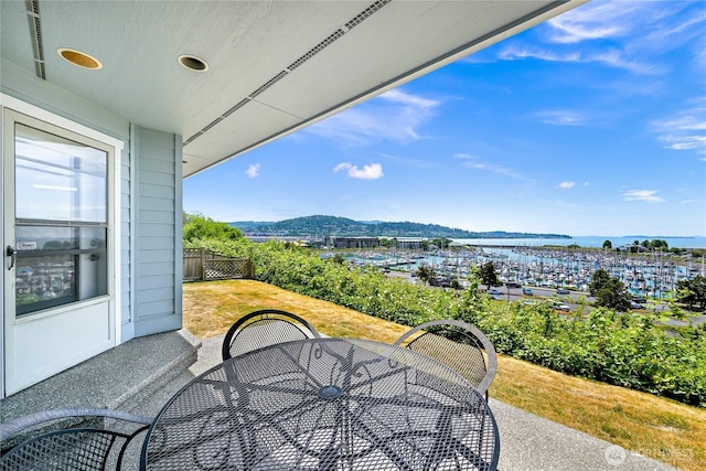 2011 Eldridge Ave, Bellingham, WA 98225 - view of patio featuring outdoor dining space and a water view