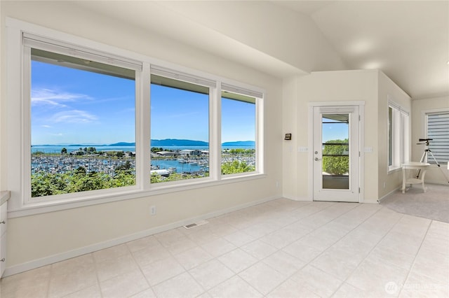 2011 Eldridge Ave, Bellingham, WA 98225 - spare room with healthy amount of natural light, a water view, and light tile patterned floors