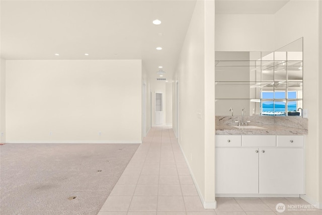 2011 Eldridge Ave, Bellingham, WA 98225 - indoor wet bar featuring light tile patterned floors and recessed lighting