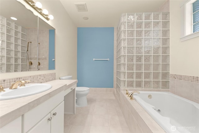 2011 Eldridge Ave, Bellingham, WA 98225 - bathroom with a jetted tub, vanity, tile patterned flooring, and a tile shower