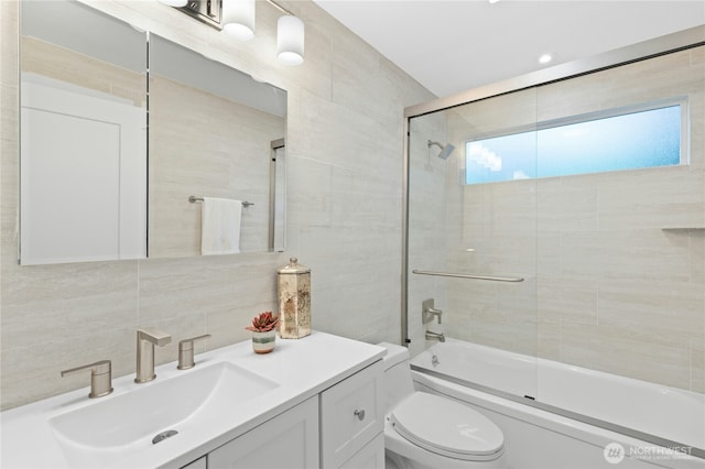 14517 SE 41st Ln, Bellevue, WA 98006 - full bath featuring tile walls, vanity, enclosed tub / shower combo, and tasteful backsplash