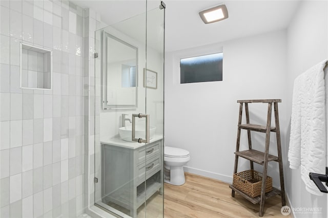 14517 SE 41st Ln, Bellevue, WA 98006 - full bath with vanity, wood finished floors, and a tile shower