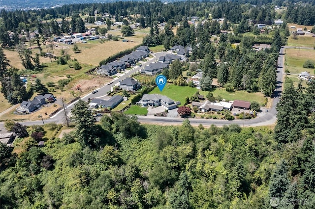 4024RD E Caldwell, Edgewood, WA 98372 - aerial view of property's location with a forest and nearby suburban area
