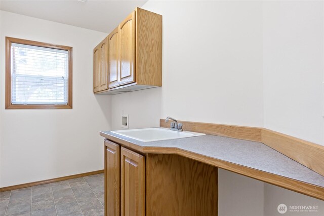 4024RD E Caldwell, Edgewood, WA 98372 - washroom with cabinet space and washer hookup