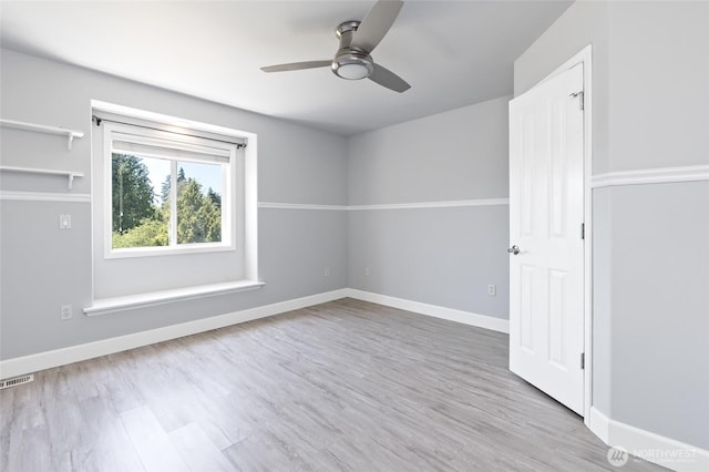 4024RD E Caldwell, Edgewood, WA 98372 - unfurnished room featuring ceiling fan and wood finished floors