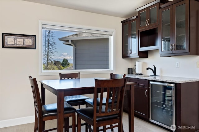 4024RD E Caldwell, Edgewood, WA 98372 - dining area featuring wine cooler and light wood-style flooring
